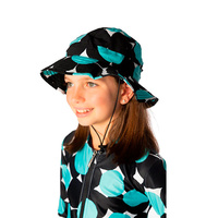 side view of girl wearing the Bubble Gum Swim Hat
    		