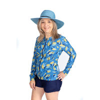 Woman smiling posing wearing a fedora
    		