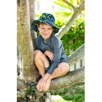 boy sitting on a tree wearing an Abstract print sun hat
    		