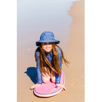 girl at the beach wearing the Candy Sprinkles Swim Hat
    		