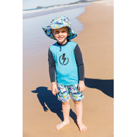 boy wearing the Surf Swim Hat at the beach
    		
