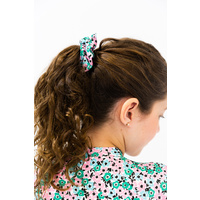 Back of head of girl wearing scrunchie 