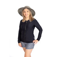 Woman smiling posing wearing a fedora 